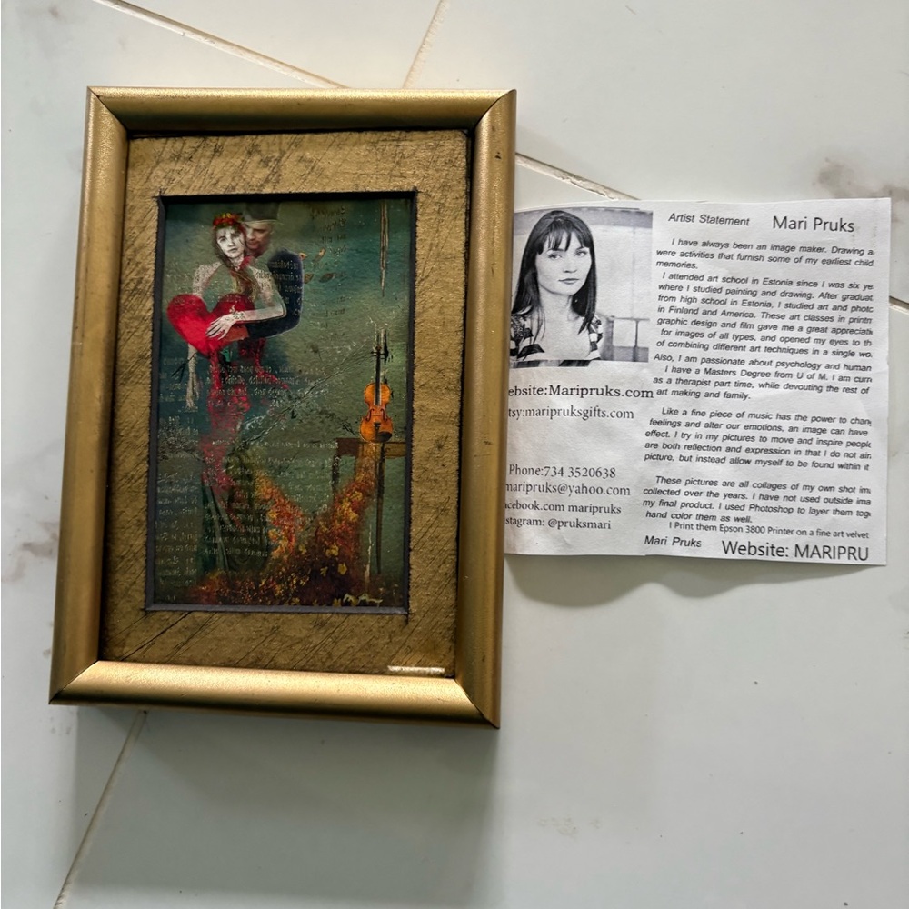 Gold Framed Art with Red and Green Accents